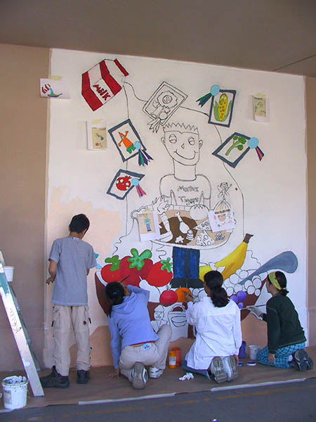 Mural being painted by 5th grade students