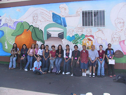 Group photo of San Fernando High students with Susan Krieg