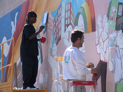 Community members painting