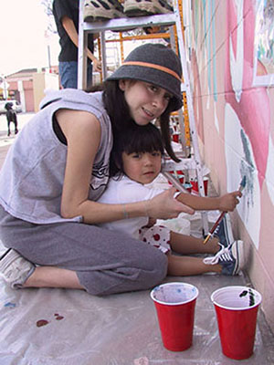 Community members painting